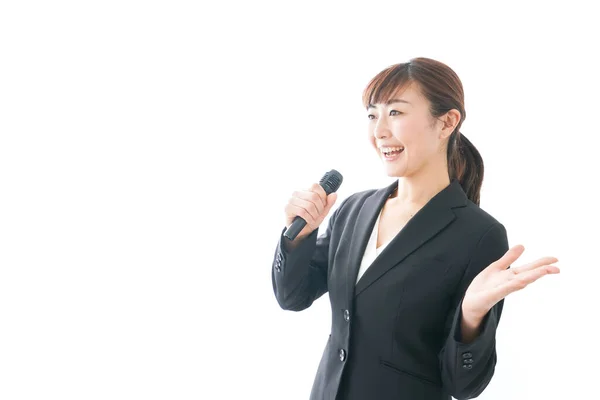 Business Woman Making Presentation Using Microphone — стоковое фото