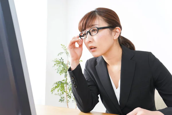 stock image Business woman suffering from over time job