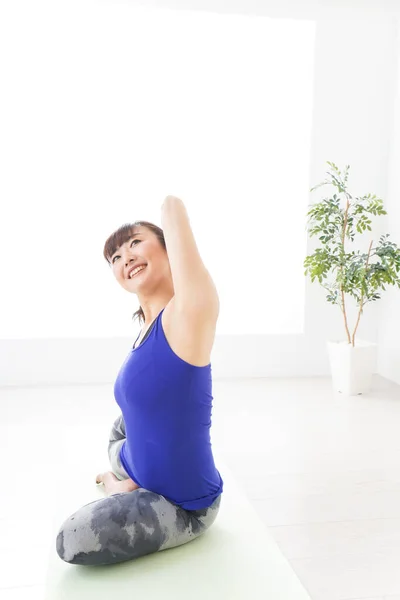 Young Woman Doing Yoga Exercise Stock Image