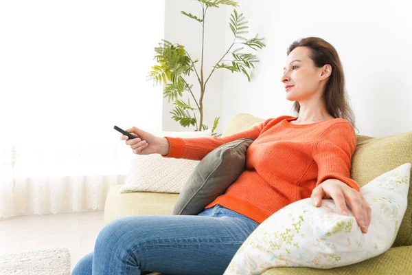 Young Woman Watching Home — Stock Photo, Image