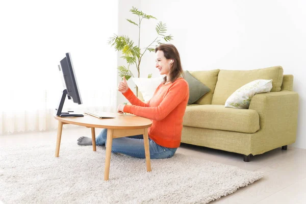 Online English lecture and teacher in front of computer