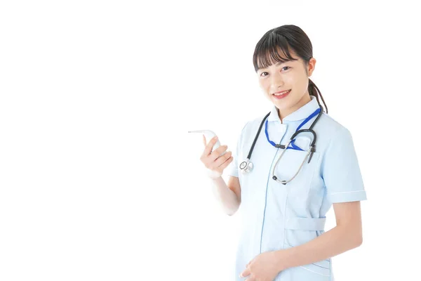 Young Nurse Measuring Body Temperature — Stock Photo, Image