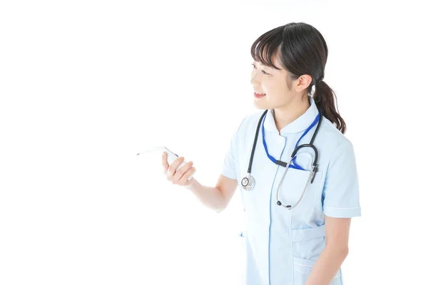 Young Nurse Measuring Body Temperature — Stock Photo, Image