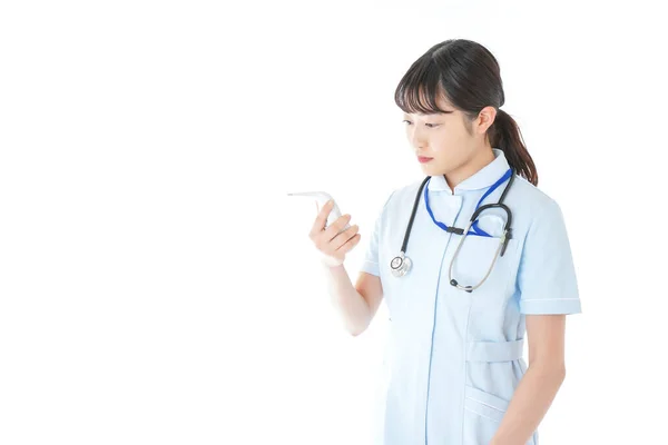 Young Nurse Measuring Body Temperature — Stock Photo, Image