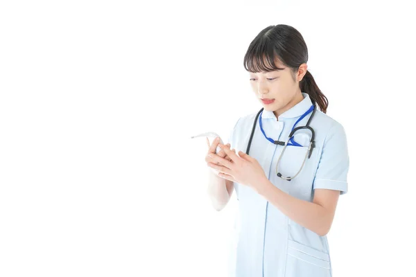 Young Nurse Measuring Body Temperature — Stock Photo, Image