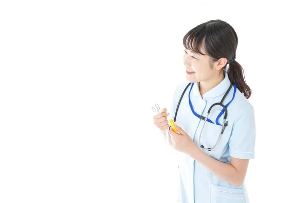 Ung Sjuksköterska Med Medicinsk Utrustning — Stockfoto