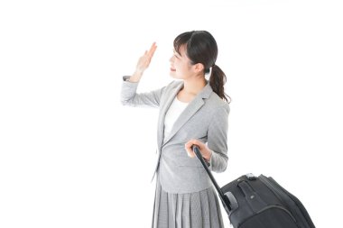 Genç bir iş kadını iş gezisine çıkıyor.