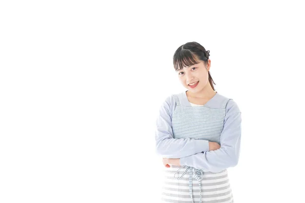 Junge Hausfrau Lächelt Mit Weißem Hintergrund — Stockfoto
