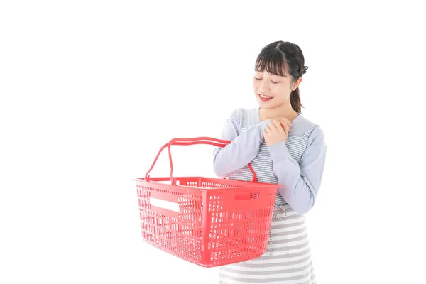 Young Woman Holding Empty Shop Basket White Background — Stock Photo, Image