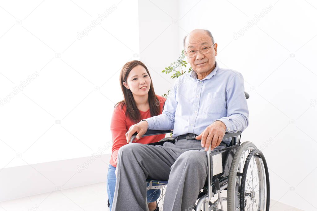 Woman care for elderly person