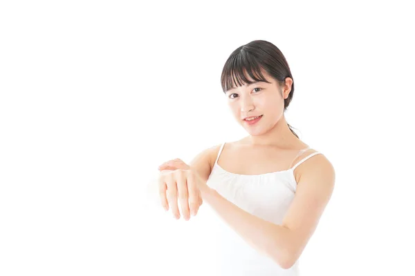 Young Woman Using Body Milk — Stock Photo, Image