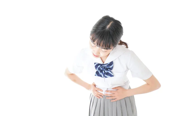 Iskoláslány Mosollyal Szenved Menstruációs Görcsök — Stock Fotó