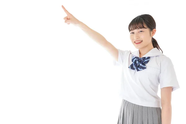 Smiling Young Asian Female Student Pointing Something — Stock Photo, Image