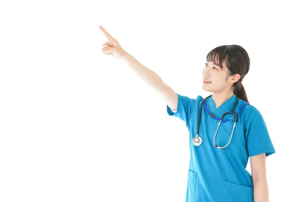 Young Nurse Smile Pointing Something — Stock Photo, Image