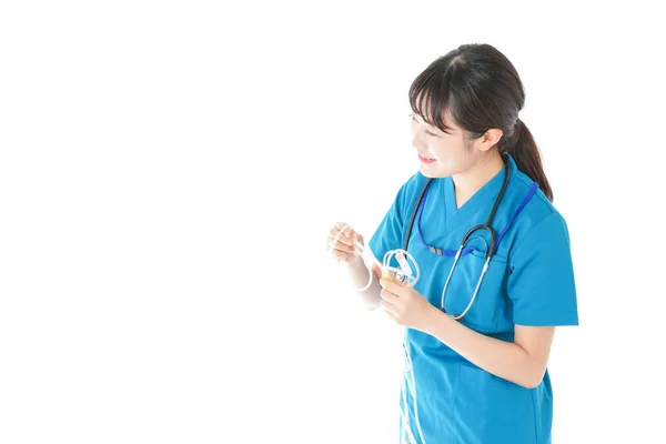 Young Nurse Using Drip — Stock Photo, Image