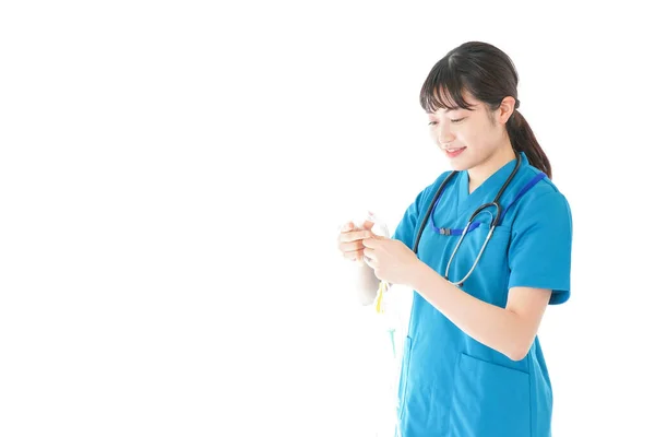 Young Nurse Using Drip — Stock Photo, Image