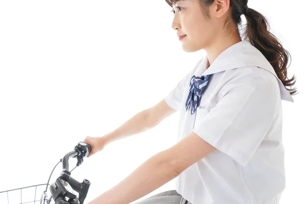 若い学生は自転車で学校に行く — ストック写真