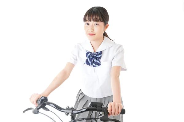 若い学生は自転車で学校に行く — ストック写真