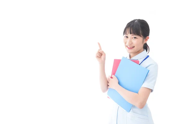 Young Nurse Pointing Something — Stock Photo, Image