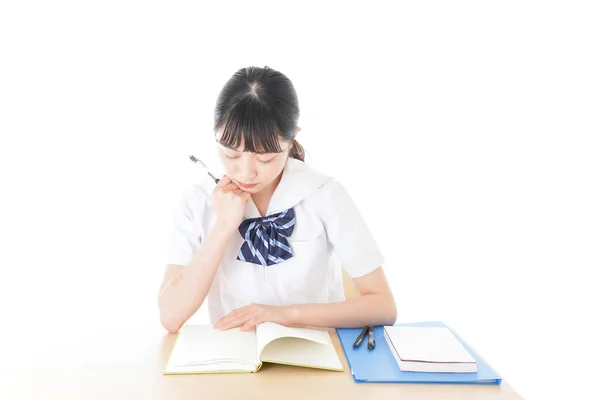 Ung Kvinnlig Student Uniform Studerar Vid Skrivbordet — Stockfoto