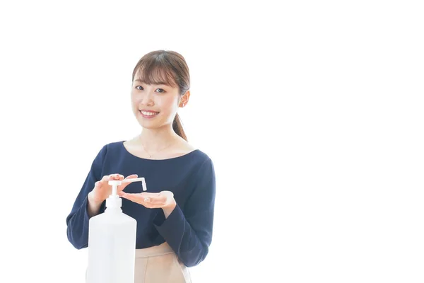 Young Woman Wearing Mask Cleaning Her Hands — Stock Photo, Image