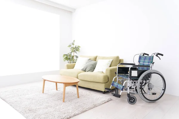 Barrier free housing image with nobody. Wheelchair in the room