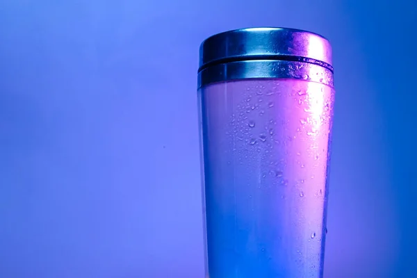 Cocktail shaker in pink tones on purple background — Stock Photo, Image