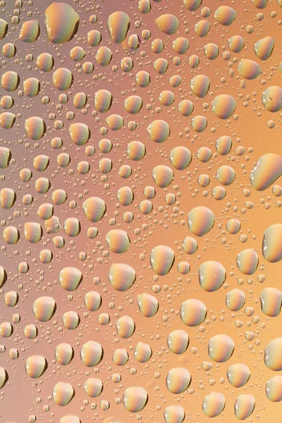 Primo piano di gocce d'acqua su sfondo colore sfumato. bolle sfondo astratto — Foto Stock