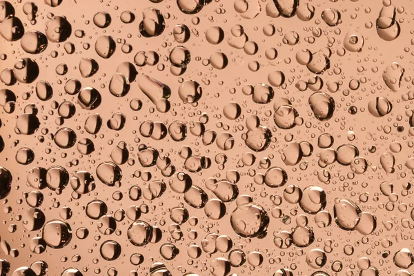 Macro shot of liquid droplets with reflection. color background with water drops texture. gradient color — Stock Photo, Image