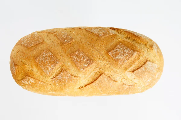 Frans stokbrood op een witte achtergrond met ruimte voor tekst. product van meel. Brood lange vorm. vlakke locatie een levensmiddel op een witte achtergrond. — Stockfoto