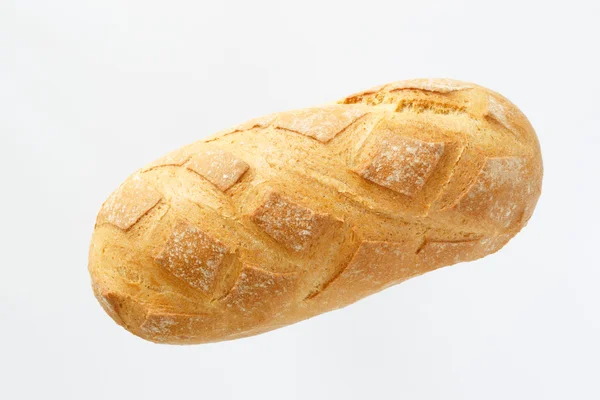 French baguette on a white background with space for text. product of flour. Bread long form. flat location a food on a white background. — Stock Photo, Image