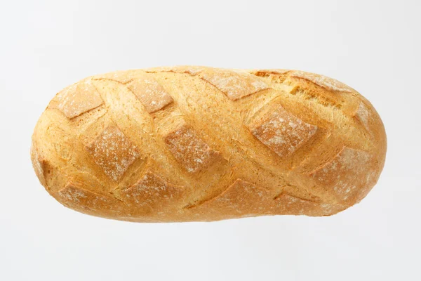 Frans stokbrood op een witte achtergrond met ruimte voor tekst. product van meel. Brood lange vorm. vlakke locatie een levensmiddel op een witte achtergrond. — Stockfoto