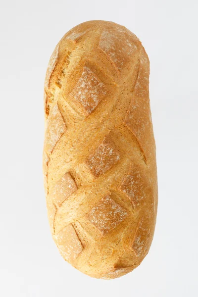 Frans stokbrood op een witte achtergrond met ruimte voor tekst. product van meel. Brood lange vorm. vlakke locatie een levensmiddel op een witte achtergrond. — Stockfoto