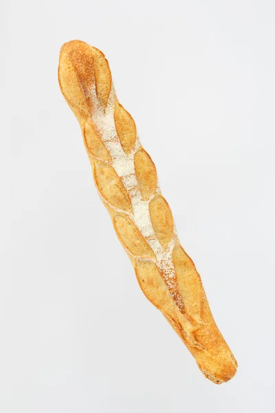 在白色背景上的法国面包。查看从上面。面粉产品生 — 图库照片