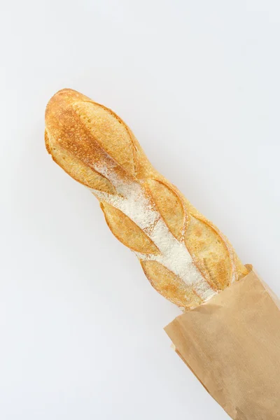 Pan francés sobre fondo blanco. vista desde arriba. producto de la harina engendrar — Foto de Stock
