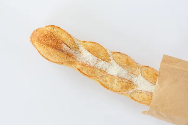 Francia kenyér, fehér alapon. Nézd meg felülről. termék Liszt nemz — Stock Fotó