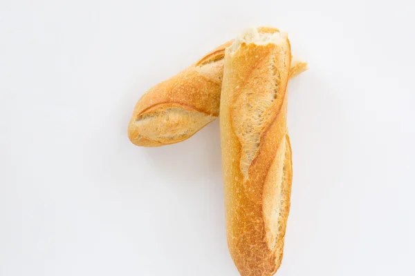 Baguette sobre un fondo claro con un lugar para la inscripción — Foto de Stock