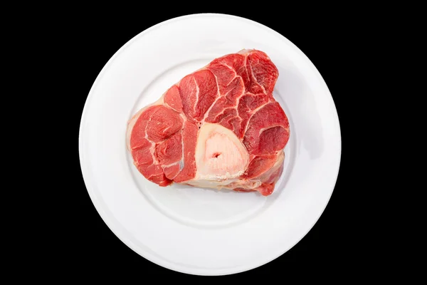 Jeden kawałek mięsa surowego mięsa wołowego z kością w środku — Zdjęcie stockowe