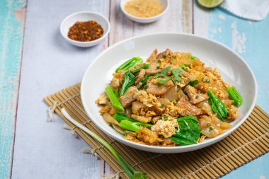 Thai food; Fried noodle with pork in soy sauce and vegetable