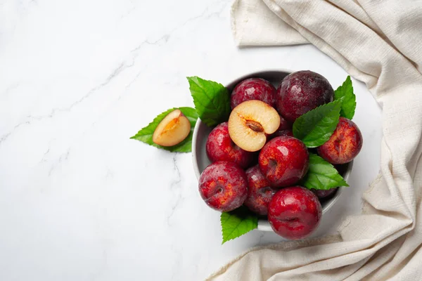 Red Plum Put White Bowl White Floor — Photo