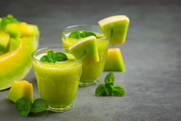 Two Glasses Melon Juice Put Dark Floor — Foto Stock