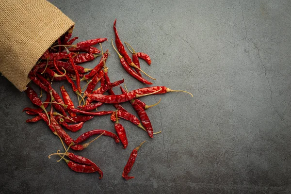 Dried Chili Pepper Pouring Out Sac Floor — Zdjęcie stockowe