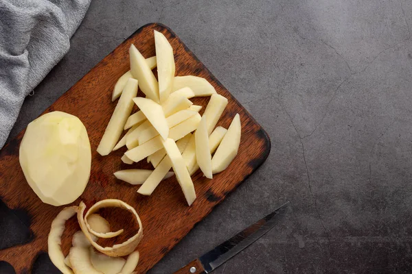 Potatoes Sliced Sticks Dark Background — Fotografia de Stock