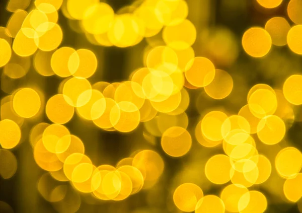 Beautiful Golden Bokeh Effect Bright Lights Blurred Dark Background Close — Stock Photo, Image