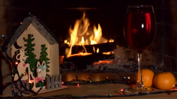Holiday Season Christmas Decorations Glass Drink Background Fireplace Flame Close — Stock Video