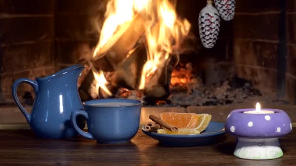 Holiday Season Cup Tea Accessories Sweets Tea Background Fireplace Flame — Stock Video