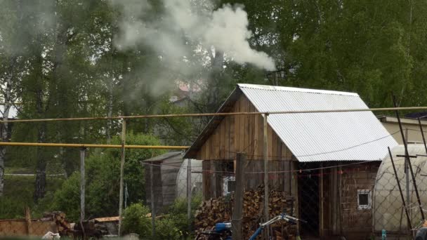 Smoke Comes Out Steel Pipe Farm House Background Cherry Blossoms — Wideo stockowe