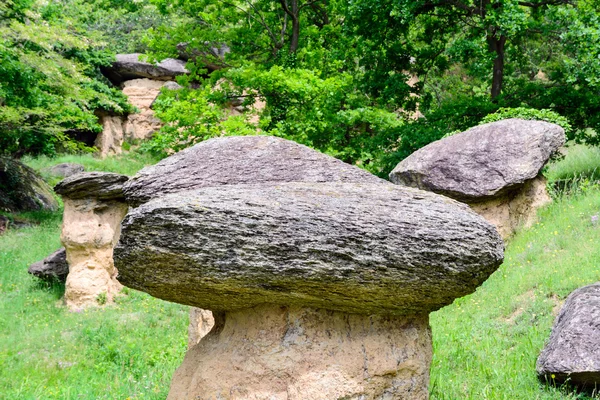 Erratic boulders on earth pillars — Stock Photo, Image