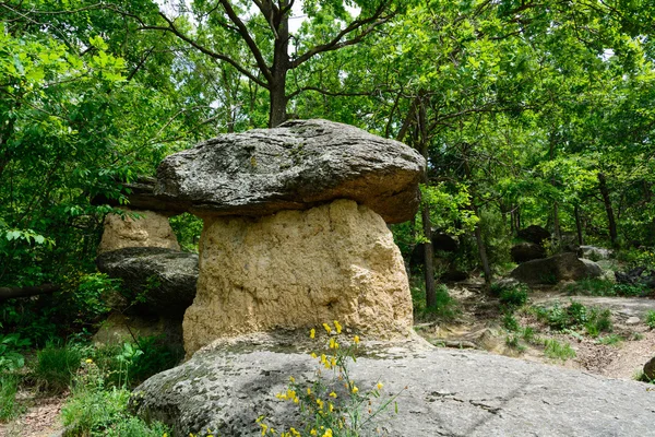 Erratic boulders on earth pillars Royalty Free Stock Images