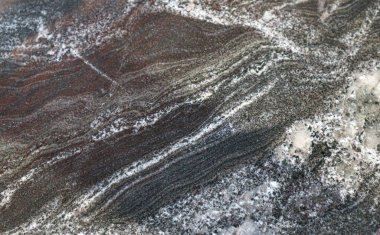 pürüzsüz yüzeyde, iç veya dış mimari ve dekoratif yapı için yakın görüş açısından granit tasarım arka planına sahip siyah mermer dokusu soyut desen.